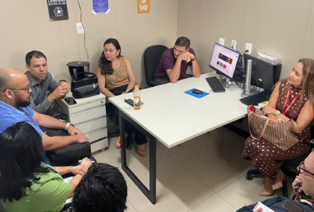 Reunião de equipe técnica para alinhamento e planejamento de ações.  